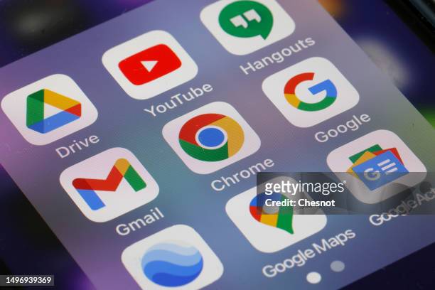 In this photo illustration, Google app logos, Drive, YouTube, Gmail, Chrome, Google and Google Maps are displayed on the screen of an iPhone on June...