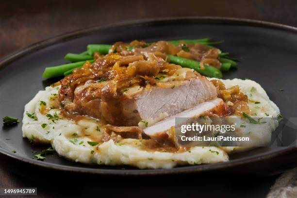 braciola di maiale disossata di cipolla francese - filetto foto e immagini stock