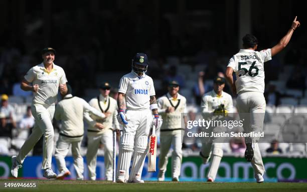 Mitchell Starc of Australia celebrates the wicket of Virat Kohli of India during day two of the ICC World Test Championship Final between Australia...