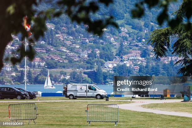 Scientific police truck is seen close to the crime scene in the Paquier park where a man stabbed multiple people on June 8, 2023 in Annecy, France....