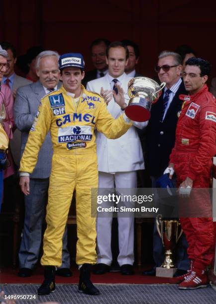 Prince Rainier III of Monaco , Prince Albert II of Monaco, President of the FIA Jean-Marie Balestre and Michele Alboreto driver of the third placed...