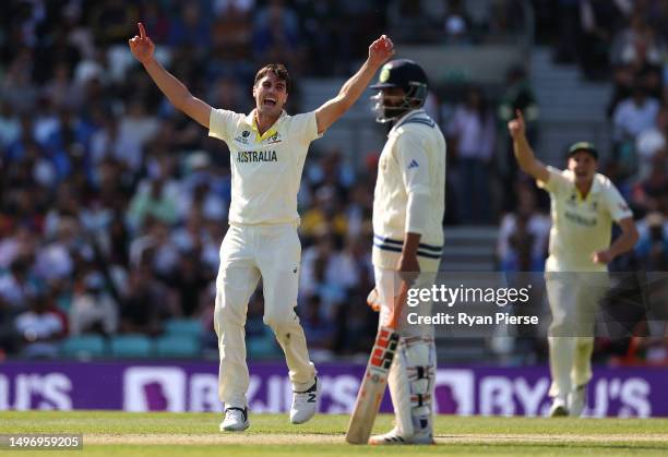 Pat Cummins of Australia celebrates after taking the wicket of Ajinkya Rahane of India before it was ruled a no ball during day two of the ICC World...