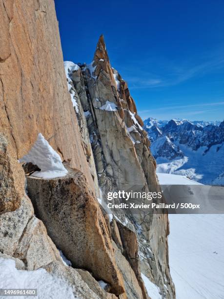 scenic view of snowcapped mountains against blue sky,aiguille du midi,france - aiguille du midi stock-fotos und bilder