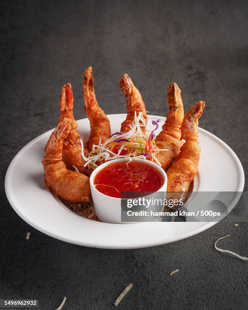 high angle view of meat in plate on table,multan,punjab,pakistan - multan stock pictures, royalty-free photos & images