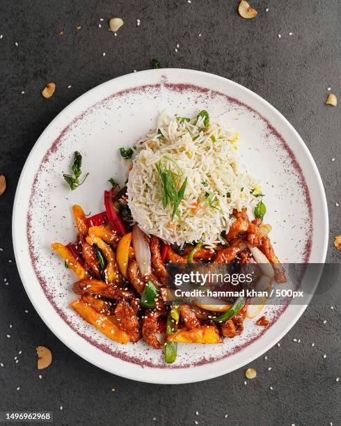 directly above shot of food in plate on table,multan,punjab,pakistan - vegetable fried rice stock-fotos und bilder