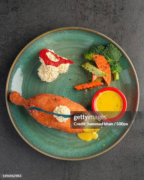 directly above shot of food in plate on table,multan,punjab,pakistan - multan stock pictures, royalty-free photos & images