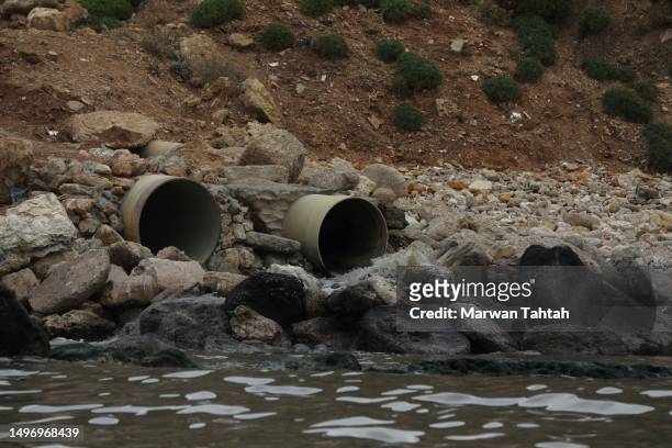 Pipelines of untreated waste water being pumped into the sea on June 8, 2023 in Beirut, Lebanon. With some 225 km of coastline harbouring Lebanon's...