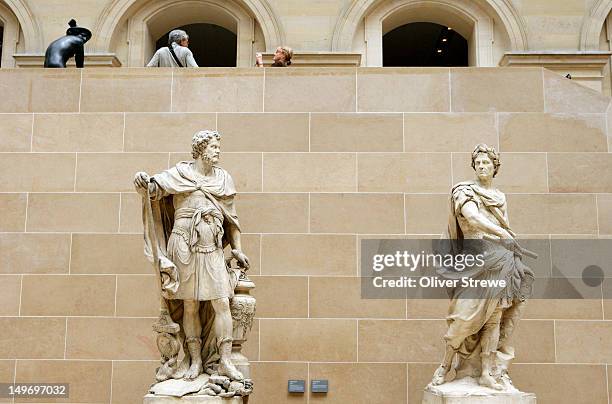 statues, annibal (by sebastien slodtz and francois girardon) and jules cesar (by nicolas coustou), louvre. - statue paris stock pictures, royalty-free photos & images