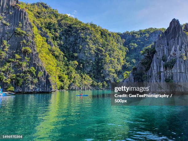 scenic view of sea against sky,palawan,philippines - ocean cliff stock pictures, royalty-free photos & images