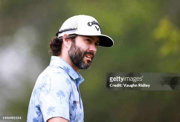 Adam Hadwin of Canada walks off the tee after hitting his first shot on the 2nd hole during the first round of the RBC Canadian Open at Oakdale Golf...
