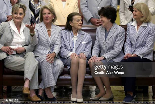 Sen. Cindy Hyde-Smith , Sen. Shelley Moore Capito , Sen. Dianne Feinstein , Sen. Susan Collins , and Sen. Lisa Murkowski wait to participate in a...