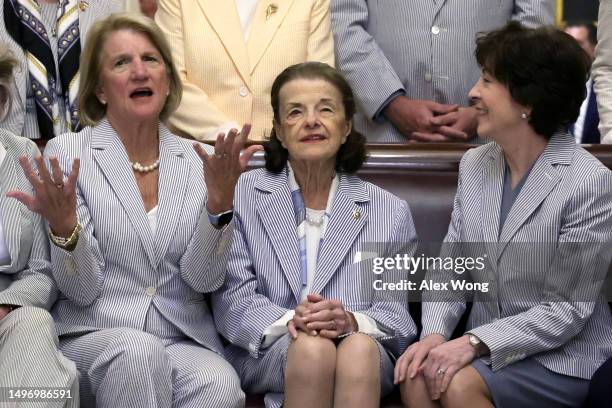 Sen. Shelley Moore Capito , Sen. Dianne Feinstein , and Sen. Susan Collins wait to participate in a photo session with Congressional staff at the...
