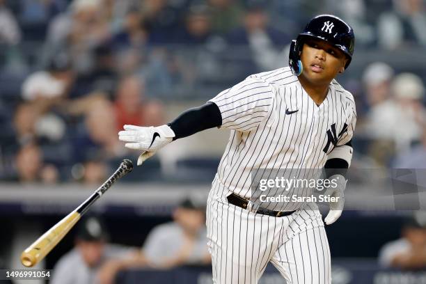 Willie Calhoun of the New York Yankees is walked to first during the seventh inning against the Chicago White Sox at Yankee Stadium on June 06, 2023...