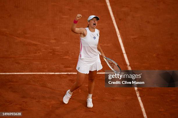 Iga Swiatek of Poland celebrates winning match point against Beatriz Haddad Maia of Brazil during the Women's Singles Semi-Final match on Day Twelve...