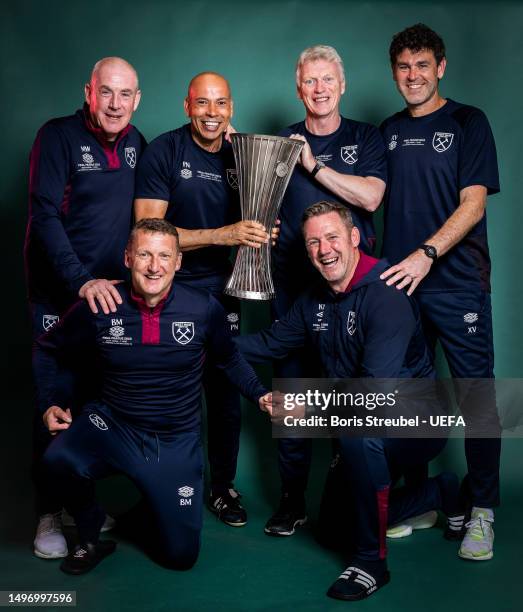 Mark Warbuton, Paul Nevin, David Moyes, Xavi Vlero, Billy McKinlay and Kevin Nolan of West Ham United poses for a photograph with the UEFA Europa...