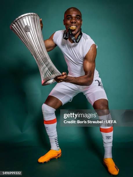 Angelo Ogbonna of West Ham United poses for a photograph with the UEFA Europa Conference League trophy after the UEFA Europa Conference League...