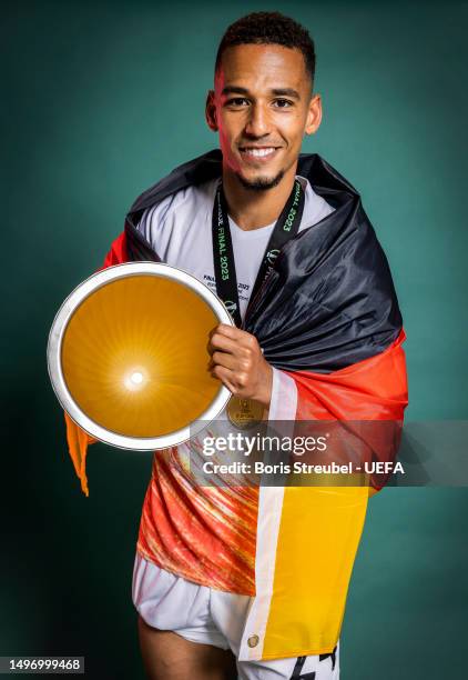 Thilo Kehrer of West Ham United poses for a photograph with the UEFA Europa Conference League trophy after the UEFA Europa Conference League 2022/23...