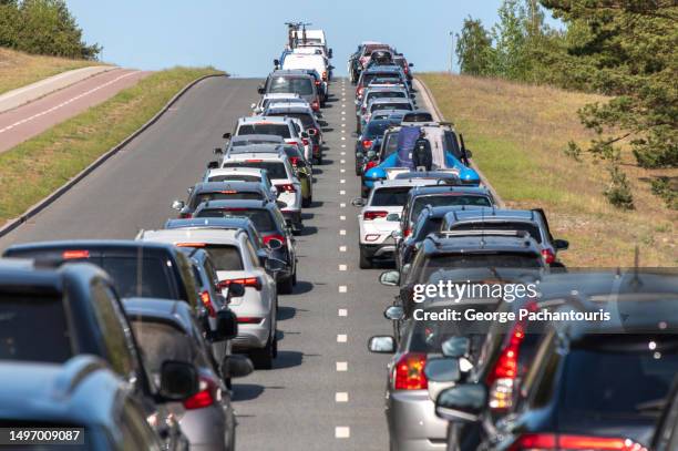 traffic jam in the countryside - busy street stockfoto's en -beelden