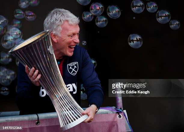 David Moyes, Manager of West Ham United, celebrates with the Europa Conference League trophy during the West Ham United trophy parade on June 08,...