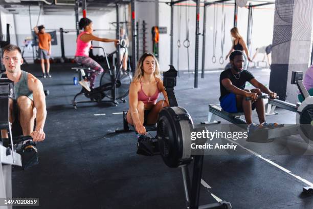 healthy lifestyle - rowing machine stock pictures, royalty-free photos & images