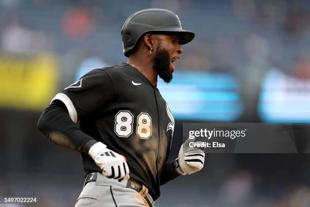 Luis Robert Jr. #88 of the Chicago White Sox celebrates his home run in the third inning against the New York Yankees during game one of a double...