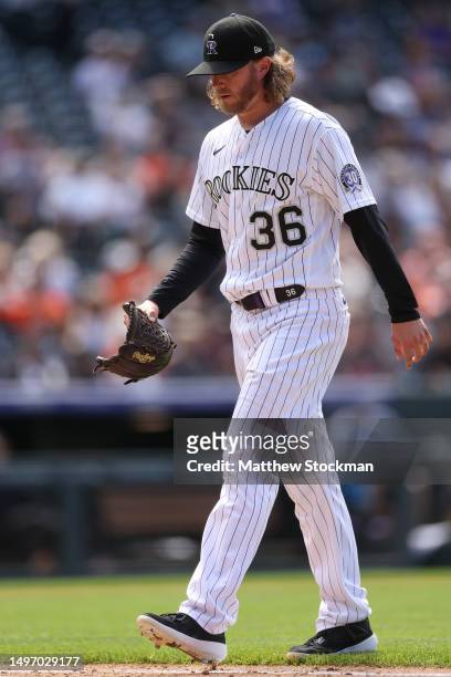 Pitcher Pierce Johnson of the Colorado Rockies leaves the game against the San Francisco Giants in the ninth inning at Coors Field on June 08, 2023...