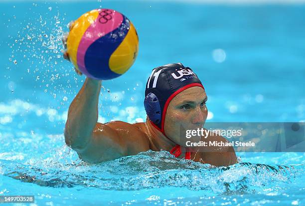 Jesse Smith of the United States competes during the Men's Water Polo Preliminary Round match between Great Britain and the United States at the...