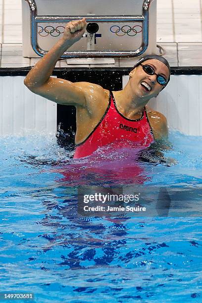 Rebecca Soni of the United States celebrates after winning gold and setting a new world record time of 2:19.59 in the Women's 200m Breaststroke Final...