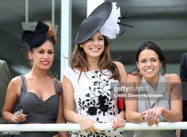 Preeya Kalidas, Kelly Brook and Michelle Rodriguez attend ladies day at 'Glorious Goodwood' on August 2, 2012 in Chichester, England.