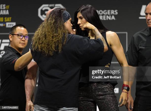 Opponents Amanda Nunes of Brazil and Irene Aldana of Mexico face off during the UFC 289 press conference at Rogers Arena on June 08, 2023 in...