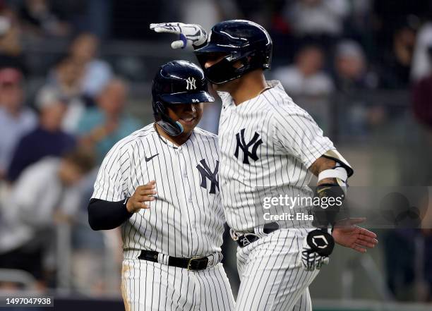 Willie Calhoun celebrates after he scored on a two run home run by Gleyber Torres of the New York Yankees during game two of a double header against...