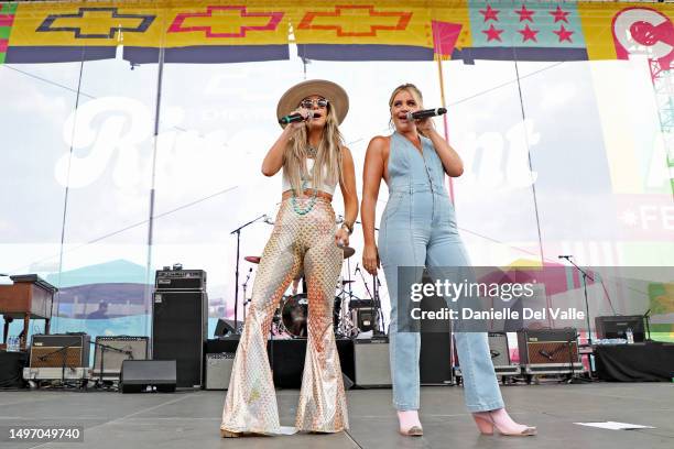 Lainey Wilson and Lauren Alaina perform onstage during day one of CMA Fest 2023 at the Chevy Riverfront Stage on June 08, 2023 in Nashville,...