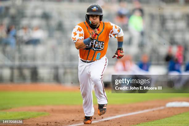 Juan Centeno of the Amarillo Sod Poodles runs home during the game against the Springfield Cardinals at HODGETOWN Stadium on June 04, 2023 in...