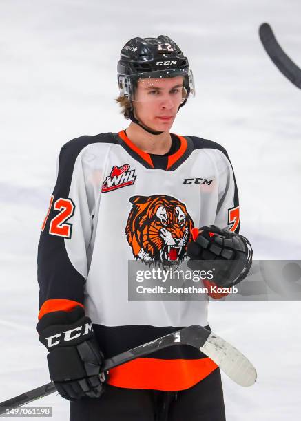 Gavin McKenna of the Medicine Hat Tigers looks on during a second period stoppage of play against the Winnipeg ICE in Game Two of the First Round of...