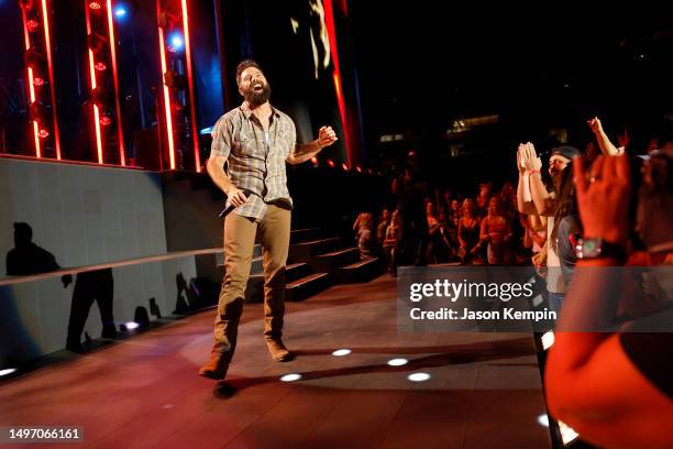 Jordan Davis performs on stage during day one of CMA Fest 2023 at Nissan Stadium on June 08, 2023 in Nashville, Tennessee.