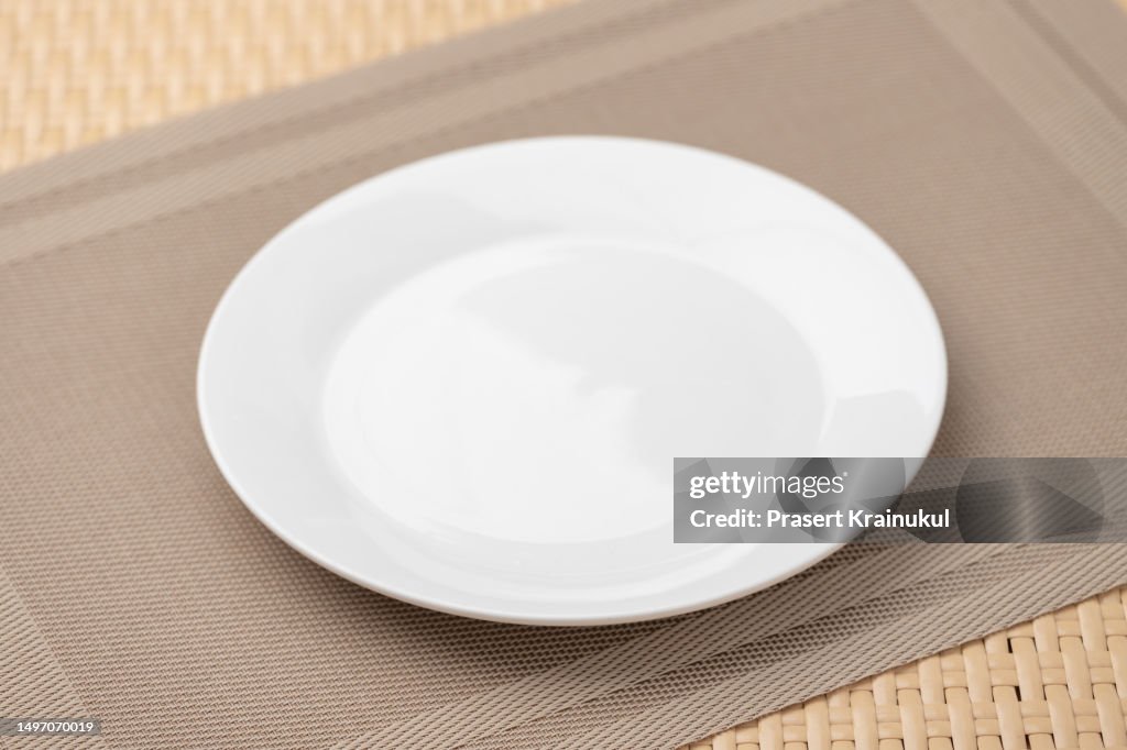 White plate on table
