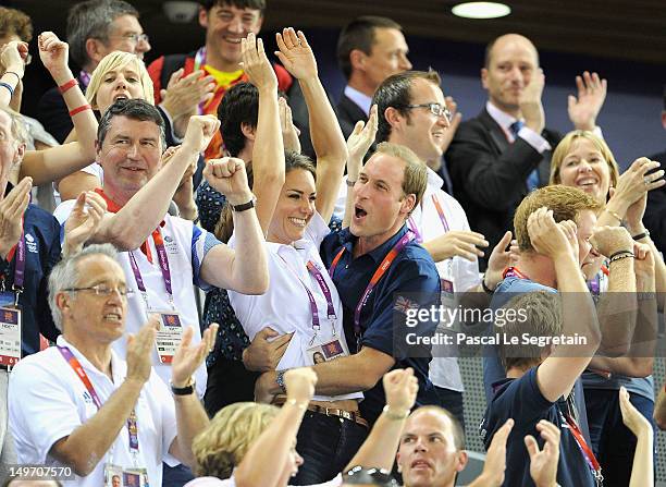 Catherine, Duchess of Cambridge and Prince William, Duke of Cambridge embrace after Philip Hindes, Jason Kenny and Sir Chris Hoy of Great Britain win...