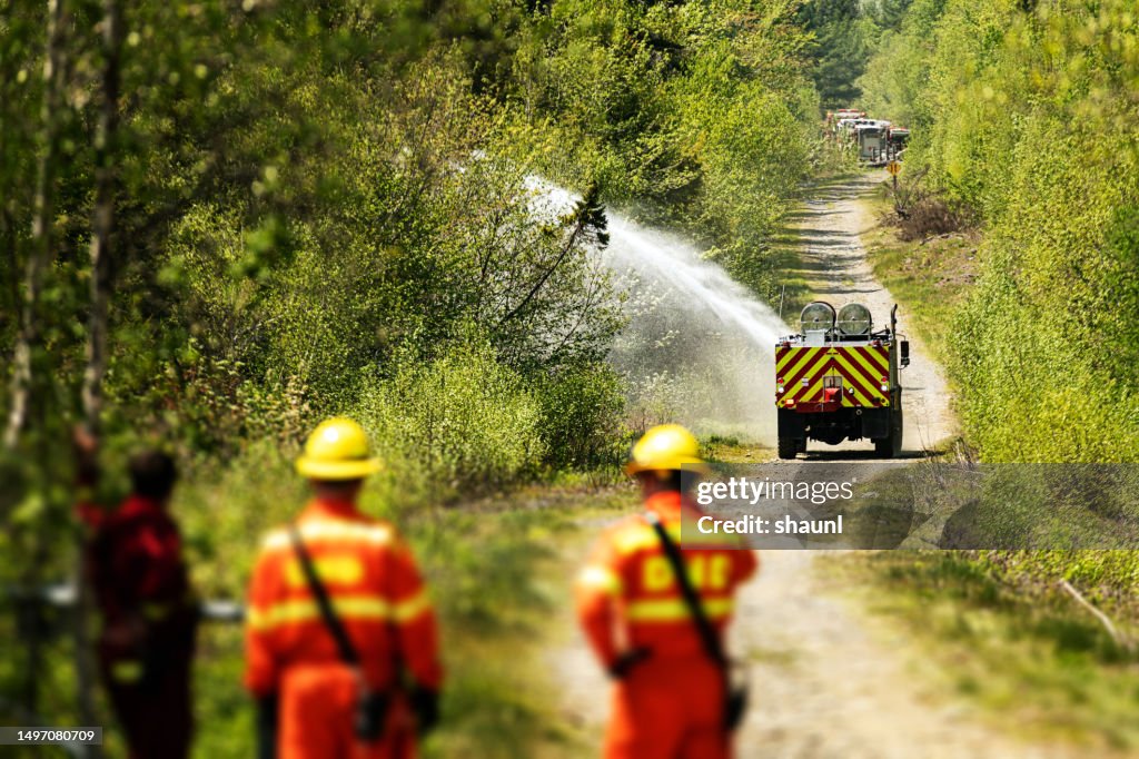 Firefighters Watch Off-Road Firetruck