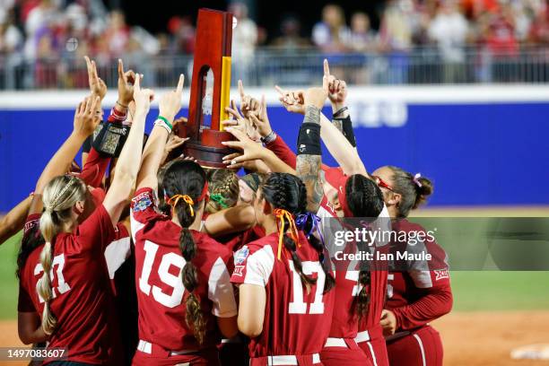 The Oklahoma Sooners celebrate after their 3-1 victory against the Florida State Seminoles to win the Championship Series during Game Two of the NCAA...