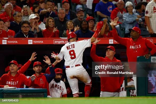 Zach Neto of the Los Angeles Angels celebrates a run against the Chicago Cubs at Angel Stadium of Anaheim on June 08, 2023 in Anaheim, California.