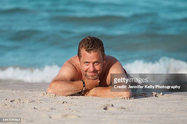 water waves relaxing male - jennifer kelly stock pictures, royalty-free photos & images