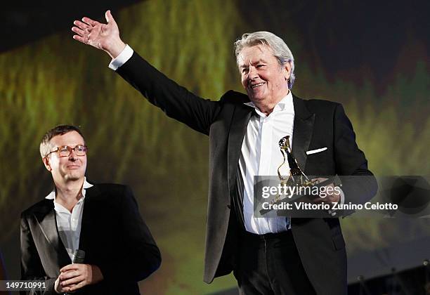 Actor Alain Delon receives the Life Achievement Award during the 65th Locarno Film Festival on August 2, 2012 in Locarno, Switzerland.