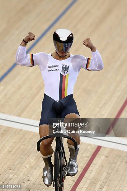 Rene Enders of Germany celebrates as he crosses the finish line during the Men's Team Sprint Track Cycling qualifying on Day 6 of the London 2012...