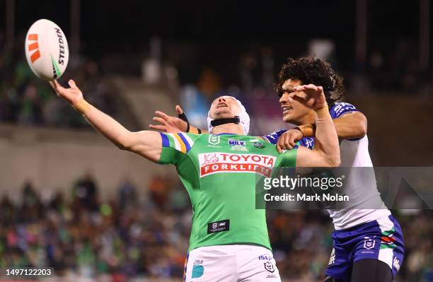Jarrod Croker of the Raiders is tackled during the round 15 NRL match between Canberra Raiders and New Zealand Warriors at GIO Stadium on June 09,...