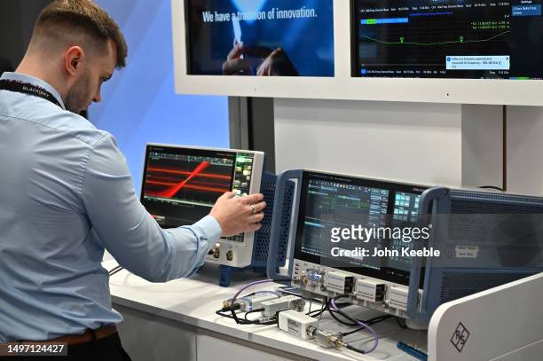 Rohde and Schwarz Oscilloscope and Vector Network Analyzer, electronic testing equipment is displayed during Space-Comm Expo 2023 at Farnborough...