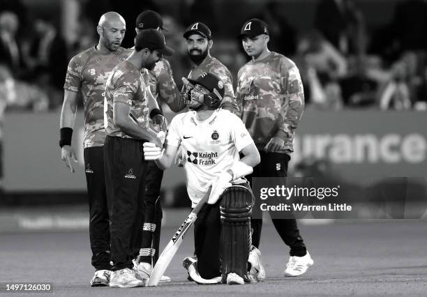 Defeated Midlleses Captain, Stephen Eskinazi shakes hands with Ravi Bopara, Captain of Sussex after Sussex win the Vitality Blast T20 match between...