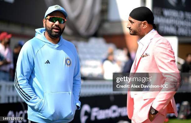 Rohit Sharma speaks with Commentator Harbhajan Singh prior to day three of the ICC World Test Championship Final between Australia and India at The...