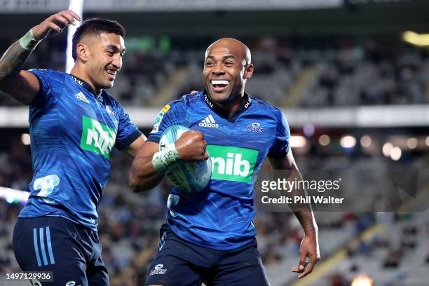 Mark Telea of the Blues celebrates his try with Rieko Ioane during the Super Rugby Pacific Quarter Final match between Blues and Waratahs at Eden...