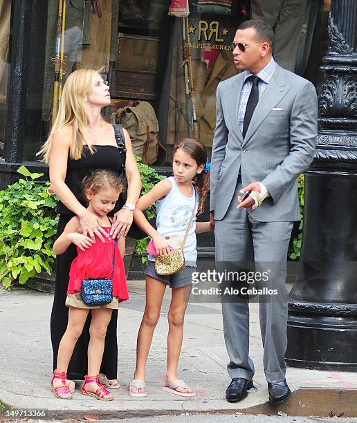 Alex Rodriguez and Cynthia Scurtis are seen with their daughters Ella Rodriguez and Natasha Rodriguez in the West Village on August 2, 2012 in New...