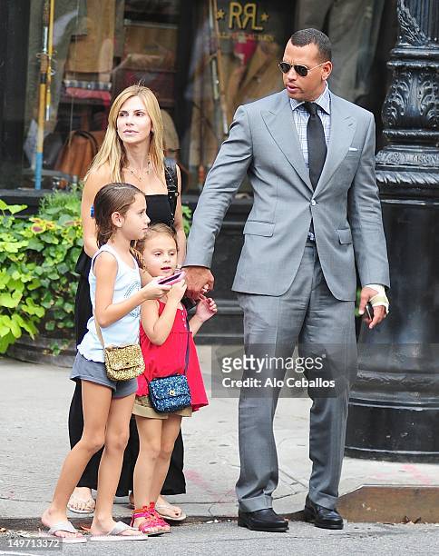 Alex Rodriguez and Cynthia Scurtis are seen with their daughters Natasha Rodriguez and Ella Rodriguez in the West Village on August 2, 2012 in New...